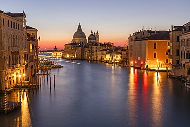 Morning atmosphere in front of sunrise, view of the Grand Canal from the Ponte dell' Accademia, Basilica Maria della Salute in the background, long exposure, Venice, Italy, Europe