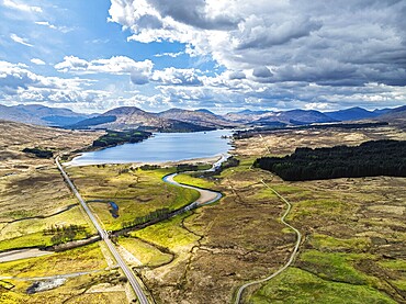 Mountains and Moors over Loch Tulla and River Orchy from a drone, Highlands, Scotland, UK