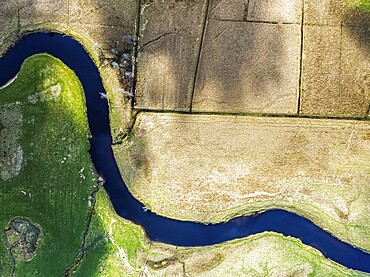 Top Down over Farms and River Dochart and Road A85 from a drone, Perthshire, Scotland, UK