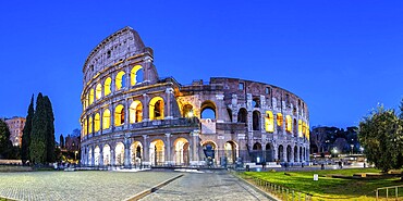 Colosseum ancient amphitheatre panorama at night in Rome, Italy, Europe