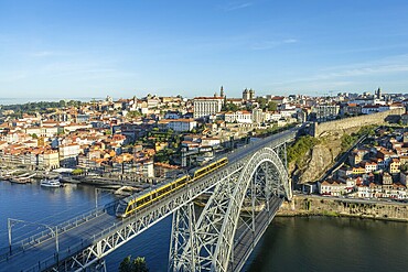 Porto City, Douro River and Dom Luis Bridge I with Tram in Morning. View from Tourist Viewpoint Miradouro da Serra do Pilar. Portugal