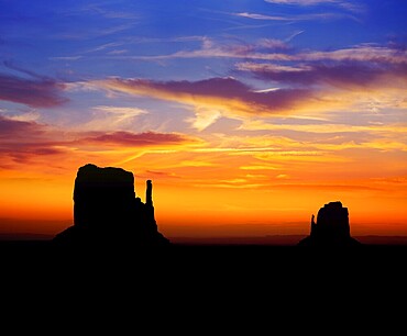 Sunrise at Monument Valley West and East Mittens Butte Utah National Park