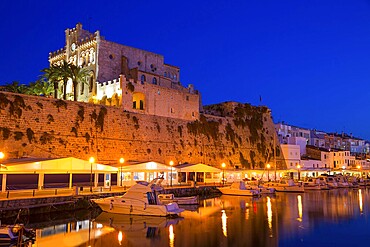 Ciutadella Menorca city town Hall and Port sunset with boats in Balearic Islands