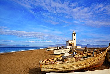 Cabo de Gata in Almeria at San Miguel Beach and Salinas church with stranded boats