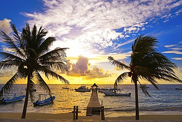Riviera Maya sunrise pier in Caribbean Mayan Mexico