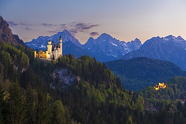 Two castles in an idyllic mountain landscape at sunset, Neuschwanstein, Hohenschwangau, Schwangau near Füssen, Ostallgäu district, Swabia, Bavaria, Germany, Europe