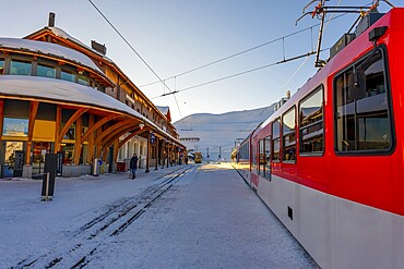 Railroad Station at 2061 Meters High Up in a Snowy Sunny Winter Day in Kleine Scheidegg, Grindelwald, Bern Canton, Switzerland, Europe