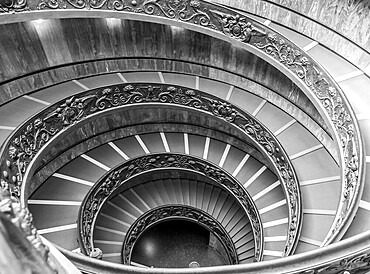 ROME, ITALY - CIRCA SEPTEMBER 2020: the famous spiral staircase with double helix. Vatican Museum, made by Giuseppe Momo in 1932