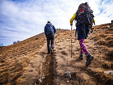 Trekking scene on Lake Como alps