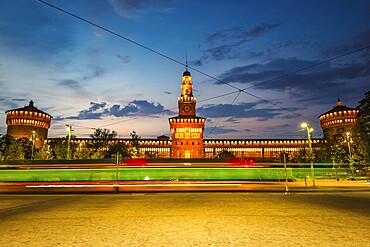 Sforzesco Castle and tram in the evening, Milan, Italy
