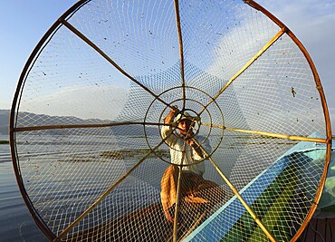 Myanmar travel attraction landmark, Traditional Burmese fisherman with fishing net at Inle lake in Myanmar