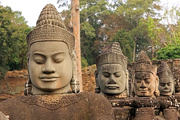 Balustrade with stone gods and demons on the bridge to the southern Tor tor of Angkor Thom