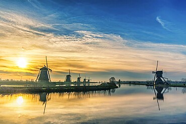 Rotterdam Netherlands, sunrise nature landscape of Dutch Windmill at Kinderdijk Village