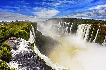 The full-flowing waterfall in the world on the Parana River. The Devil's throat /Garganta del Diablo/. Concept of extreme and active tourism