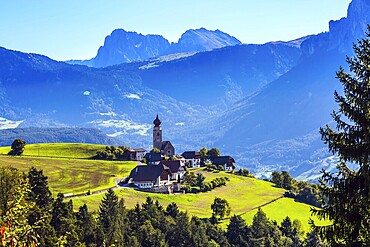 Little village in the Dolomites. Magnificent Tyrol. Journey to the fairy-tale country. The concept of ethnographic and ecotourism