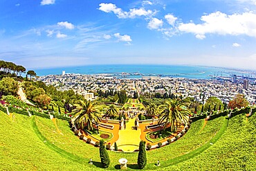 HAIFA, ISRAEL - MAY 6, 2017: Bahai World Center. View from Mount Carmel to the seaport of Haifa. Pilgrimage center and popular tourist destination. Sunny day by Mediterranean Sea