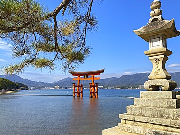 Stone lamp at the seaside close to Floating Torii gate, Hatsukaichi, Hiroshima, Japan