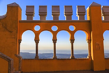 Pena castle yellow arch at sunset in Sintra, Portugal