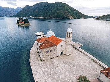 The island of Gospa od Skrpjela, Kotor Bay, Montenegro. Aerial survey of drones, Montenegro