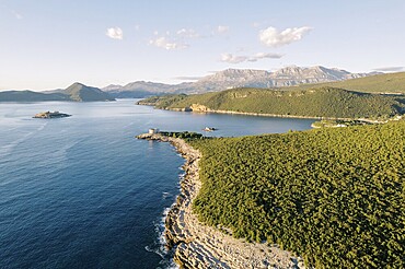 Lustica peninsula against the backdrop of mountains and the Arza fortress. Montenegro.