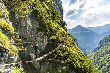 Sports via ferrata near the valley with a suspension bridge and a great view of the Berchtesgaden mountains