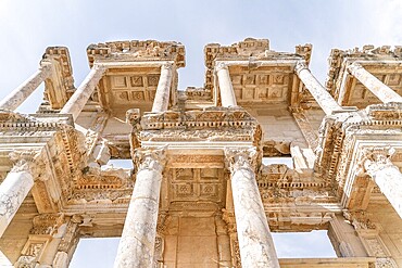 Celsus Library in Ephesus in Selcuk (Izmir), Turkey. Marble statue is Sophia, Goddess of Wisdom, at the Celcus Library at Ephesus, Turkey. The ruins of the ancient antique city
