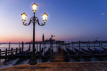 Dawn, Venetian gondolas with the church of San Giorgio Maggiore in the background, Venice, UNESCO World Heritage Site, Veneto, Italy