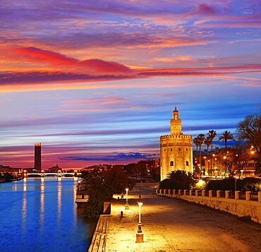 Seville sunset skyline torre del Oro in Sevilla Andalusia Spain