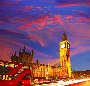 Big Ben Clock Tower with London Bus sunset in England