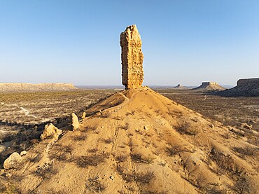 The Vingerklip (rock finger) and the Ugab Valley Terraces are surrounded by thornbush and mopane (Colophospermum mopane) savanna. Aerial view. Drone shot. Damaraland, Namibia