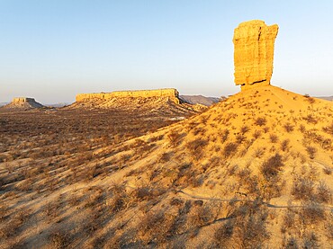 The Vingerklip (rock finger) and the Ugab Valley Terraces are surrounded by thornbush and mopane (Colophospermum mopane) savanna. Aerial view. Drone shot. Damaraland, Namibia
