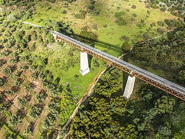 Cycle path Via Verde Del Aceite, old railroad track passes through olive fields, cycle path on bridge, near village Cabra, Andalusia, Spain