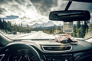 Winter road trip on the Icefields Parkway with lots of snow and ice, Banff National Park, Jasper National Park, Alberta, Canada