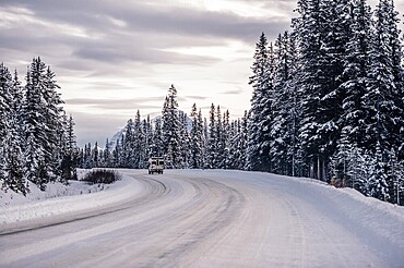 Winter road trip on the Icefields Parkway with lots of snow and ice, Banff National Park, Jasper National Park, Alberta, Canada