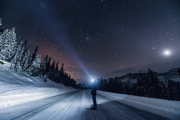 Starry sky during a winter road trip on the Icefields Parkway with lots of snow and ice, Banff National Park, Jasper National Park, Alberta, Canada