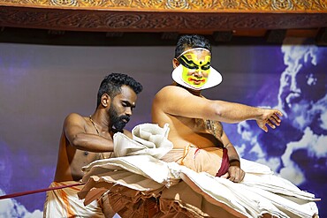 Kathakali performer gettig dreesed, Kerala, malayalam traditional classic indian dance, mime, drama and music act, hindu mythology story, puranas, Thekkady in India, 25.03.2025