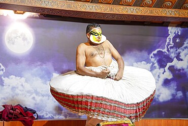 Kathakali performer gettig dreesed, Kerala, malayalam traditional classic indian dance, mime, drama and music act, hindu mythology story, puranas, Thekkady in India, 25.03.2025