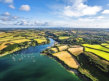 Farms and Fields over St Mawes from drone, Carrick Roads, River Fal, Falmouth, Cornwall, UK