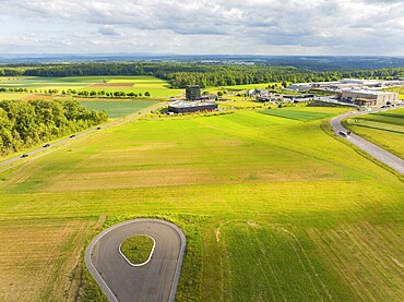 Wide green fields with a country road and surrounding rural landscape, ING Park development area, Zweckverband INGpark Nagold Gäu, Nagold, Germany