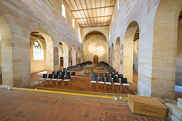 Church interior with pews and cross under bright daylight, event and wedding location Lorch Monastery, Lorch, Germany