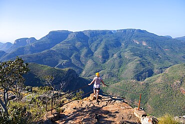 Tourist at the viewpoint, view of the Blyde River gorge, Lowveld Viewpoint, in the evening light, canyon landscape, Blyde River Canyon, Panorama Route, Mpumalanga, South Africa