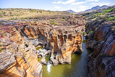 Canyon with steep orange-coloured cliffs with the Blyde River, Bourke's Luck Potholes, Panorama Route, Mpumalanga, South Africa