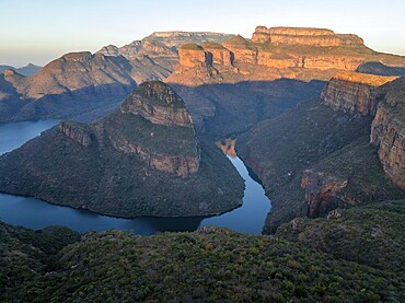 Sunset at Blyde River Canyon with Three Rondawels peak, view of canyon with Blyde River and table mountains in the evening light, canyon landscape, Panorama Route, Mpumalanga, South Africa