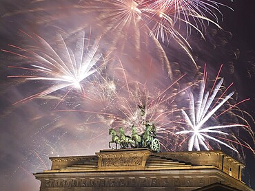 Fireworks over the Brandenburg Gate in Berlin, Germany, during New Year concert and celebrations