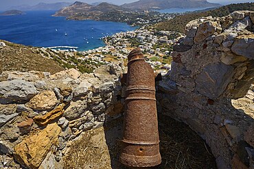 Old cannon on ruins overlooking the sea and surrounding landscape of hills, Pandeli Castle, Castle, Leros Fortress, St John's Fortress, Apitiki Hill, Pandeli Bay, Agia Marina, Leros, Dodecanese, Greek Islands, Greece