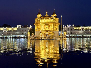 Harmandir Sahib or Hari Mandir (temple of God), usually called the Golden Temple, on an island in the artificial lake, the Amrit Sarovar. Sikh sanctuary in Amritsar, Punjab, India