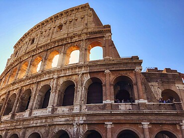 Another image of the Colosseum, bathed in warm light and showing detailed ancient architecture, Piazzeadel Colosseo, Colosseo, Rome, Italy