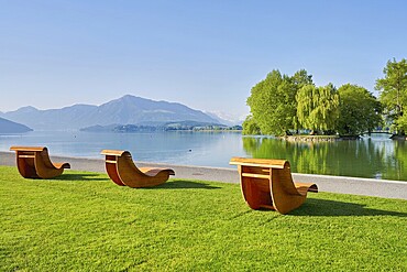 Wooden loungers on Lake Zug, behind the Rigi, Villette, Park, Cham, Canton Zug, Switzerland