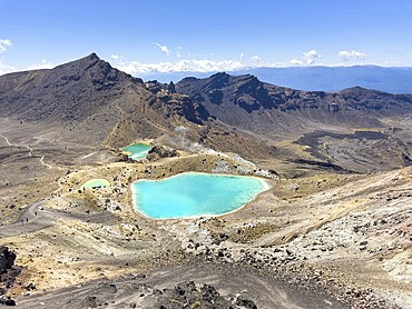 On the hiking trail of the Tongariro Alpine Crossing in Tongariro National Park with a view of the Emerald Lakes, North Island, New Zealand, Oceania