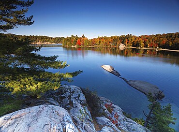 Beautiful fall nature scenery of lake George during sunset. Killarney Provincial Park, Ontario, Canada